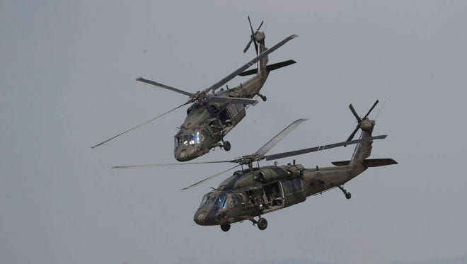 A U.S. Black Hawk helicopter, like the ones shown here participating in a combat search and rescue demonstration in Pyeongtaek, South Korea, Friday, Sept. 23, 2016, has crashed off the coast of Yemen. (Associated Press, file)