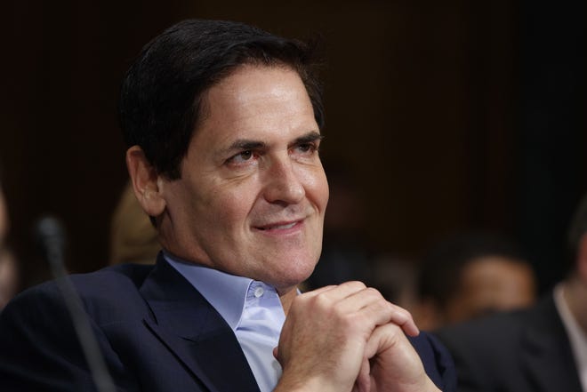 FILE - In this Dec. 7, 2016 file photo, AXS TV Chairman and Dallas Mavericks owner Mark Cuban listens on Capitol Hill in Washington. Just seven months into the Trump presidency, Republicans and right-leaning independents have begun to contemplate the possibility of an organized bid to take down a sitting president from within. (AP Photo/Evan Vucci, File)