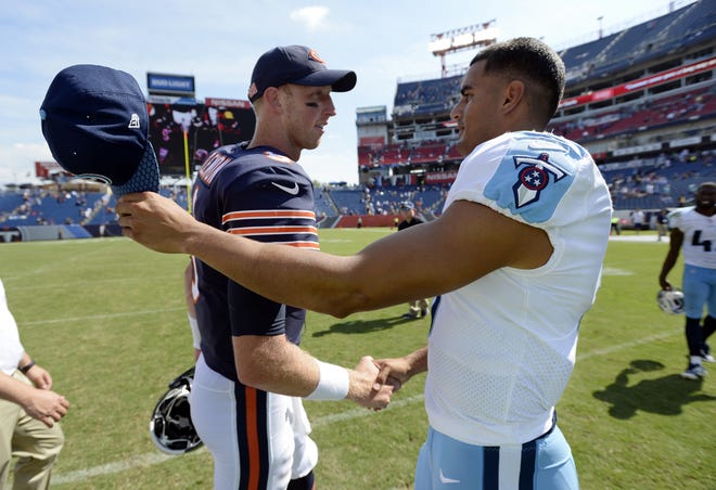 Bears quarterback Mike Glennon, left, greets Tennessee quarterback Marcus Mariota after Chicago's 19-7 NFL exhibition victory on Sunday in Nashville. [MARK ZALESKI/THE ASSOCIATED PRESS]