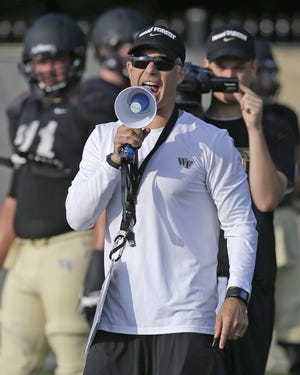 Fourth-year Wake Forest coach Dave Clawson has high hopes for Deacon offense in 2017. [Chuck Burton/The Associated Press]