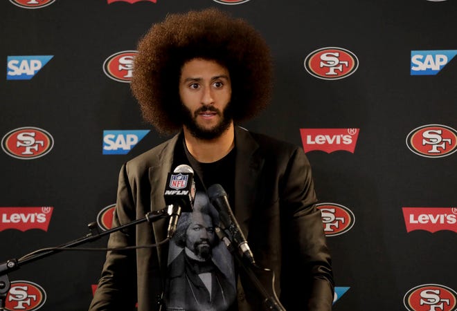 San Francisco 49ers quarterback Colin Kaepernick talks during a news conference after an NFL football game against the Los Angeles Rams Saturday, Dec. 24, 2016, in Los Angeles. The San Francisco 49ers won 22-21. (AP Photo/Rick Scuteri)