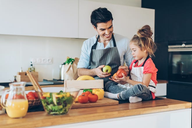 Home cooking is the smart alternative to toxic and processed food. And cooking with your kids is one of the best ways to raise healthy eaters. [ISTOCK IMAGE]