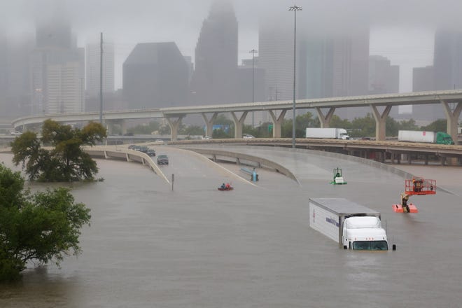 Interstate 45 in Hoston is submerged due to widespread flooding caused by Hurricane Harvey. [REUTERS/Richard Carson]