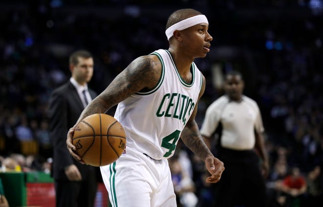 In this Jan 30, 2017, file photo, Boston Celtics guard Isaiah Thomas (4) plays in the team's NBA basketball game against the Detroit Pistons in Boston. Thomas believes he will fully recover from a right hip injury that has threatened to void his recent trade to Cleveland. Thomas, who was dealt by the Celtics to the Cavaliers last week for star Kyrie Irving, told ESPN he has made progress in his recovery. (AP Photo/Charles Krupa, File)