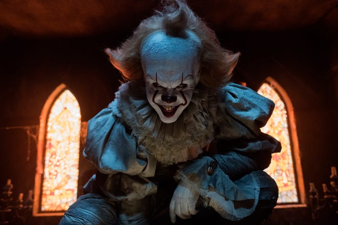 Bill Skarsgard puts an extra element of fear in his portrayal of Pennywise. [Warner Bros. Pictures]