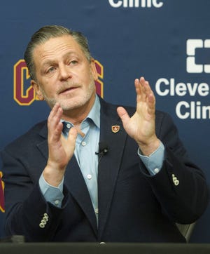 Cleveland Cavaliers chairman Dan Gilbert gestures during a press conference at the Cavaliers training facility in Independence. Gilbert vowed Thursday to never move his NBA franchise from Cleveland. (AP Photo/Phil Long, File)