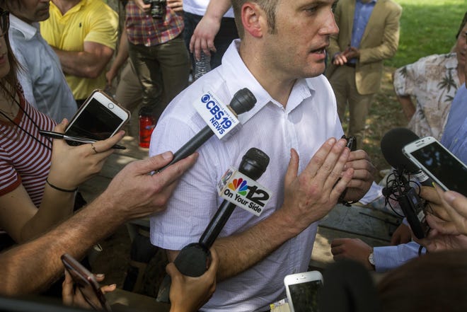 White nationalist Richard Spencer, seen on Aug. 12 in Charlottesville, Va., still wants to speak at the University of Florida and a lawyer representing him is threatening to sue the school. [Shaban Athuman/Richmond Times-Dispatch via AP]