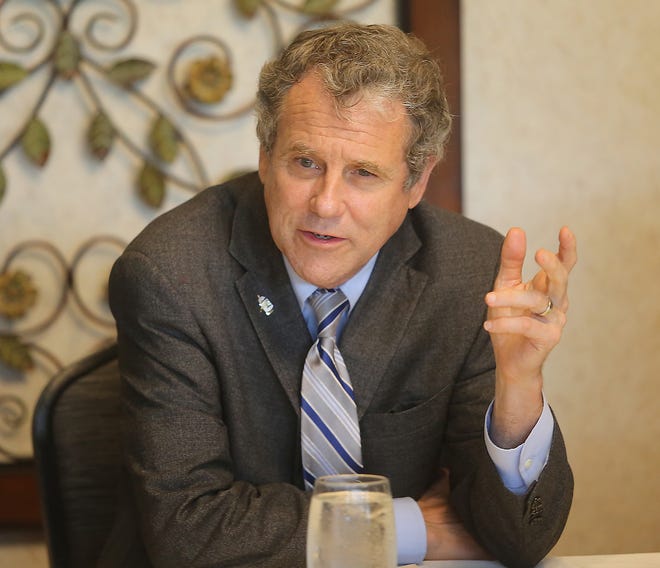 U.S. Sen. Sherrod Brown, D-Ohio, talks during a round table event on economic development with local leaders in government and business Thursday at Union Country Club.