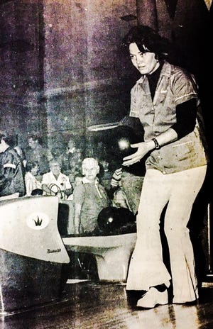 Connie Graham, of Apple valley, prepares to roll during her perfect game at the original Victor Bowl in February 1973. [Daily Press File Photo]