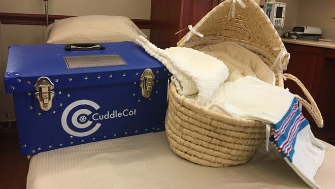 Don and Sara Hogan have donated CuddleCots to St. David’s hospitals so that families whose babies are stillborn can spend time with them. Contributed by St. David’s HealthCare