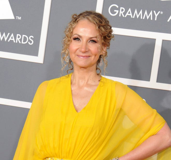 In a Sunday, Feb. 10, 2013 file photo, singer Joan Osborne arrives at the 55th annual Grammy Awards, in Los Angeles. The Grammy-nominated singer of the hit “One of Us” has put together an album of her unique takes on 13 of his classic songs. (Photo by Jordan Strauss/Invision/AP, File)