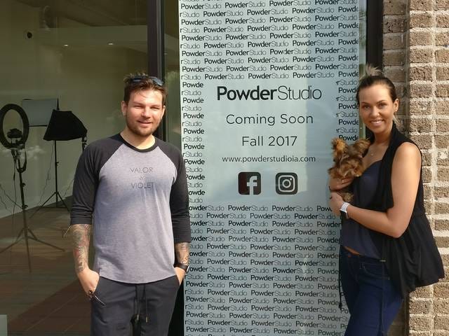 Powder Studio co-owners Josh Duchene, left, and Kelly Kasper, outside their store’s upcoming location on Main Street. The makeup studio is expected to open within the next four to five weeks. Photo by Dan Mika/Ames Tribune