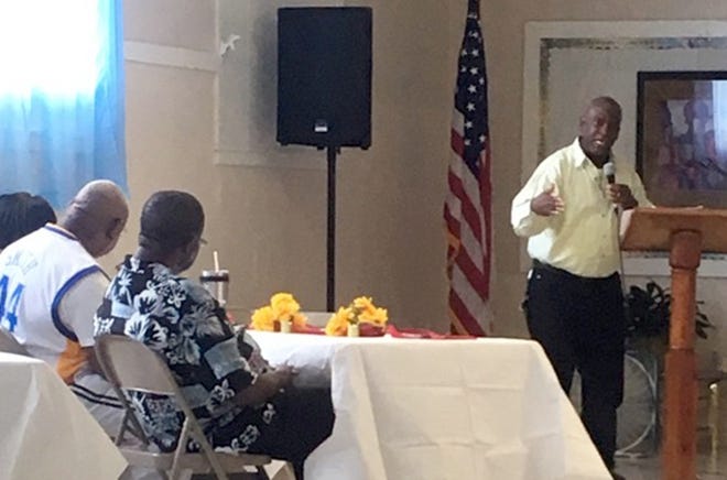 The Rev. Clay Williams discusses the Community Outreach group's work during its 17th anniversary dinner Aug. 26 in Crestview. [Charlie Bell | Special to the News Bulletin]