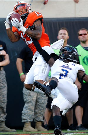 Oklahoma State's Tyron Johnson (13) was one of the receivers to make a big play in last week's win over Tulsa. The Cowboys' next opponent, South Alabama, showed it is susceptible to big plays in the passing game during its opening loss to Ole Miss on Saturday. [PHOTO BY SARAH PHIPPS, THE OKLAHOMAN]