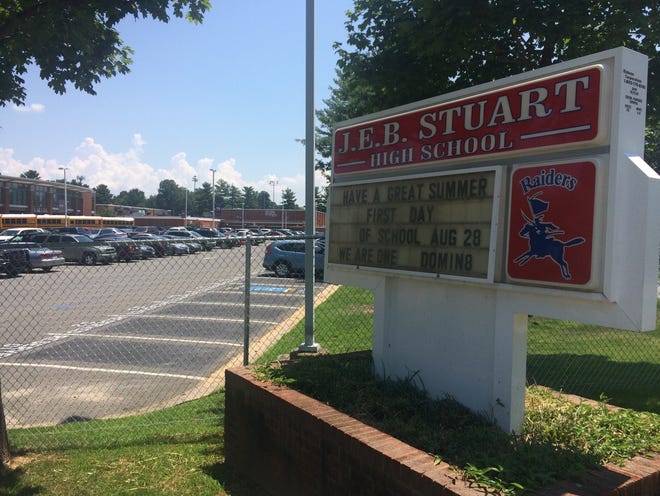 This photo shows the sign for J.E.B. Stuart High School in Falls Church, Va., named after the slaveholding Confederate general who was mortally wounded in an 1864 battle. Education officials around the nation are grappling with whether to remove the names, images and statues of Confederate figures from public schools, some of which are now filled with students of color who could be descendants of those whom the South fought to keep in slavery. [MATT BARAKAT/AP PHOTO]