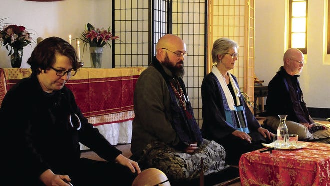 COURTESY PHOTO/WET MOUNTAIN SANGHA Members of the Wet Mountain Sangha of Pueblo are led by Sensei Andrew Palmer (second from left) and Sara Bender, roshi of Springs Mountain Sangha in Colorado Springs (second from right). Kaci Barnet (far left) and David Cockrell also participate.