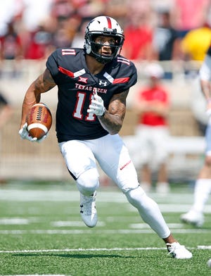 Texas Tech’s Derrick Willies (11) runs down the field with the ball during the game against Eastern Washington, Saturday, Sept. 2, 2017, in Lubbock, Texas. (Brad Tollefson/A-J Media)