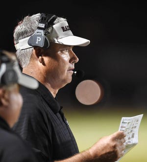 Navarre High coach Jay Walls saw his team move to 2-0 after rallying past Booker T. Washington in the second half on Friday night. [FILE PHOTO/DAILY NEWS]