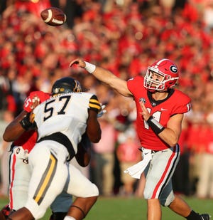 Georgia freshman quarterback Jake Fromm throws a pass against Appalachian State in a game Saturday, Sept. 2, 2017 in Athens. (Curtis Compton/Atlanta Journal-Constitution via AP)