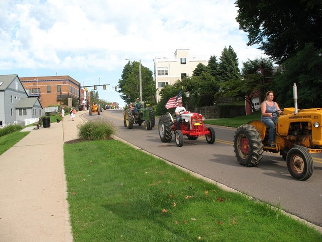 The tractor parade goes through downtown South Haven. [Contributed]
