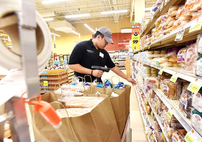 More stores offering grocery delivery, pick-up options