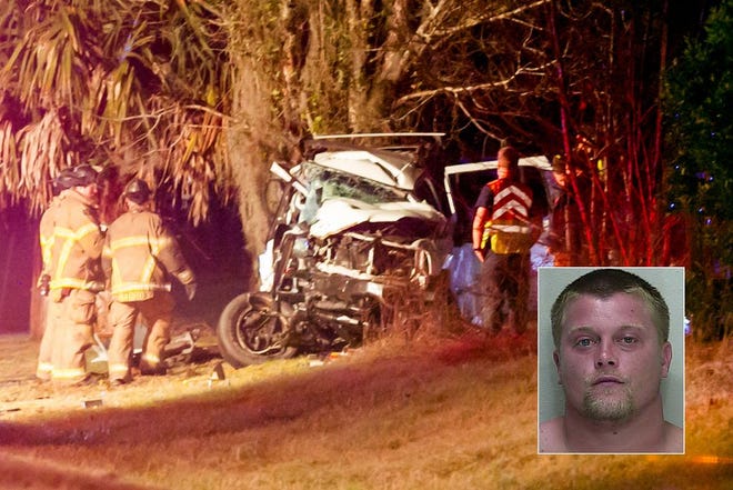 Marion County Fire Rescue workers work on the wreckage of a vehicle that collided with a tow truck as the Florida Highway Patrol investigates the triple fatal accident on County Road 326 in Anthony on January 22, 2017. Two truck driver Travis Lee Johnson has been arrested in the case. [Alan Youngblood/Star-Banner/File]
