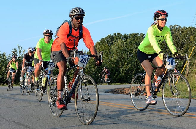 More than 400 bicyclists pedaled for a worthy cause Monday by taking part in the Tour d’Apple, a local fundraiser that coincides with the conclusion of the North Carolina Apple Festival in downtown Hendersonville.