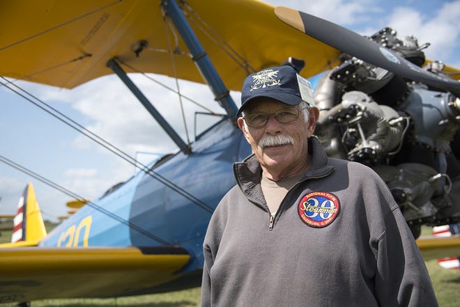 Jim Ratliff stands in front of his Stearman plane, which he flew to Galesburg from Georgia. [MITCH PRENTICE/The Register-Mail]