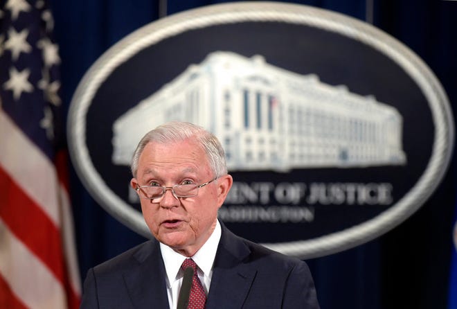 Attorney General Jeff Sessions makes a statement at the Justice Department in Washington Tuesday on President Barack Obama's Deferred Action for Childhood Arrivals, or DACA program. President Donald Trump's administration will "wind down" a program protecting hundreds of thousands of young immigrants who were brought into the country illegally as children, Attorney General Jeff Sessions declared Tuesday, calling the Obama administration's program "an unconstitutional exercise of authority."