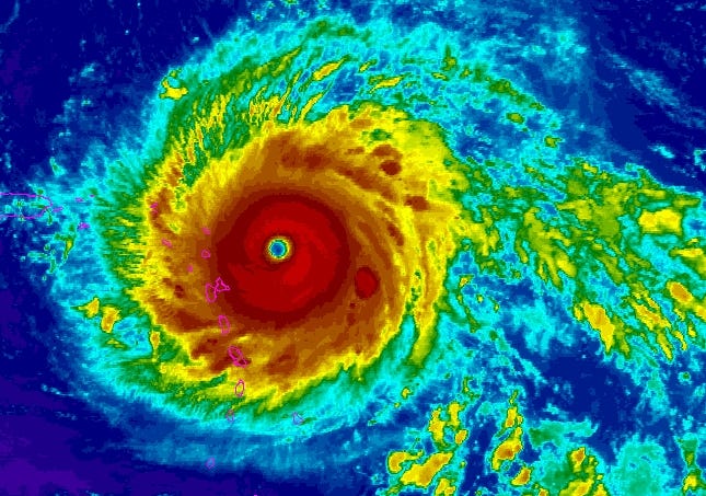 An enhanced satellite image of Hurricane Irma shows the Category 5 storm as it approaches the Leeward Islands on Tuesday. [NOAA/SPECIAL TO THE NEWS HERALD]