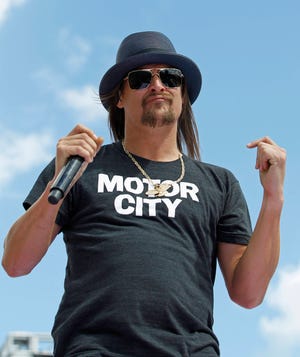 In this Feb. 22, 2015 file photo, Kid Rock performs before the Daytona 500 NASCAR Sprint Cup series auto race at Daytona International Speedway in Daytona Beach, Fla. A civil rights organization said Wednesday, Sept. 6, 2017, they are demanding the cancellation of concerts by Kid Rock at a new sports arena in Detroit, saying his criticism of NFL quarterback Colin Kaepernick was a “dog whistle” to white supremacist groups. (AP Photo/Terry Renna, File)