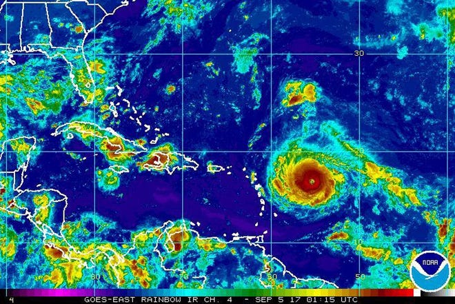 This Monday, Sept. 4, 2017, satellite image provided by the National Oceanic and Atmospheric Administration shows Hurricane Irma nearing the eastern Caribbean. Hurricane Irma grew into a powerful Category 4 storm Monday. [NOAA via AP]