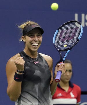 Madison Keys smiles after defeating Kaia Kanepi during Wednesday's quarterfinals of the U.S. Open. [ASSOCIATED PRESS]