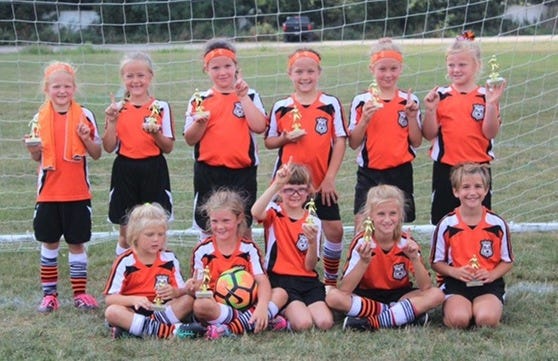 Recently the Ashland United Crush Girls U9 Soccer team won two competitive tournaments. The girls won the Target Cup August 19-20 in Ontario and won the Northern Ohio Cup September 2-3 in Lodi. Shown here after the Northern Ohio Cup victory are (front, from left) Aubree Hess, Addison Hess, Layne Martin, Oaklynn Burns, Allie Heckman; (back) Kenzie Hellickson, Gia North, Jersey Behrendsen, Elianna Markel, Josie Vantilburg and Rowyn Garn. Not pictured is Lauren Thoma. The girls are coached by Kristen Garn and Amanda Hess.