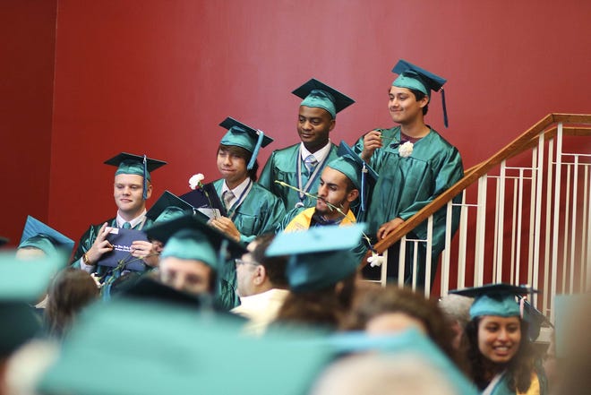 Isaac Bear Early College High School holds its graduation ceremony June 3 at UNCW. The region's early colleges earned the highest scores in school performance grades this year.