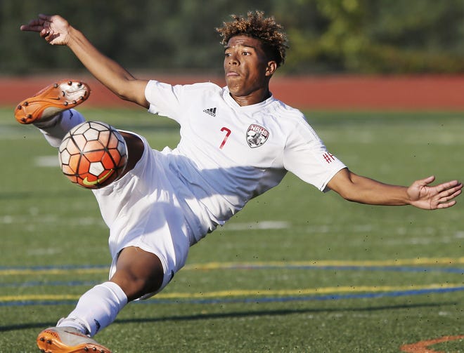 New Bedford's Marcos Estavao lets go a second half shot on goal during New Bedford's 3-1 win over Bishop Connolly. [MIKE VALERI/THE STANDARD-TIMES/SCMG]