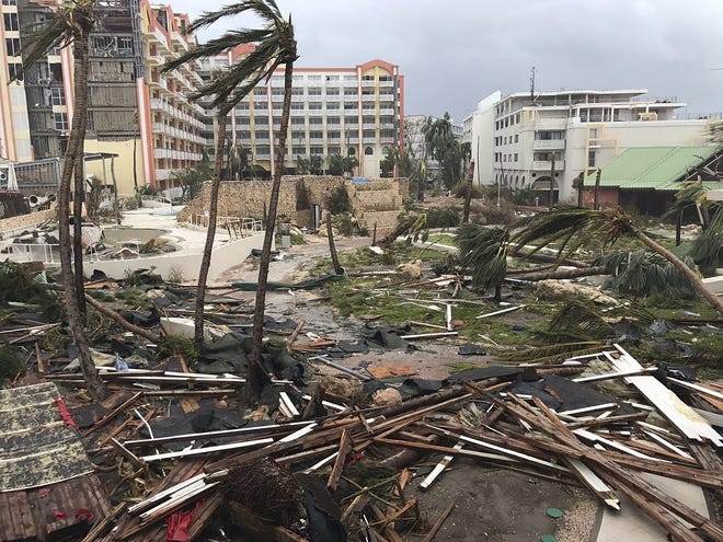 This Sept. 6, 2017 photo shows storm damage in the aftermath of Hurricane Irma in St. Martin. Irma cut a path of devastation across the northern Caribbean, leaving thousands homeless after destroying buildings and uprooting trees. Significant damage was reported on the island known as St. Martin in English which is divided between French Saint-Martin and Dutch Sint Maarten. (Jonathan Falwell via AP)