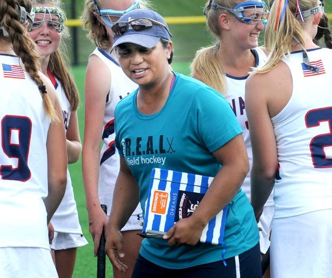 Lincoln-Sudbury field hockey coach Vicky Caburian, shown after the Warriors' win on Tuesday over Wayland, notched her 200th career victory on Thursday in L-S's 4-0 triumph over Weston.