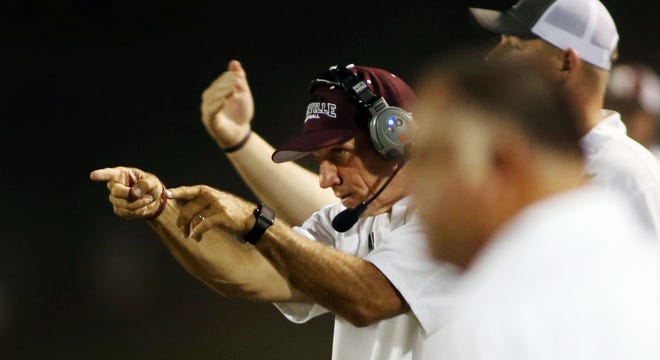 Niceville's John Hicks coaches from the sideline of a game earlier this season.