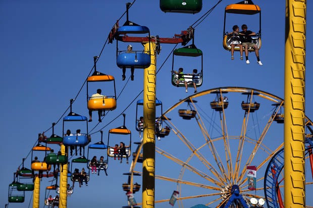 People ride in a chair lift ride during the last day of the 2013 Oklahoma State Fair in Oklahoma City. [Photo by Sarah Phipps, The Oklahoman Archives]