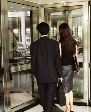 What's the etiquette for stepping in a revolving door?