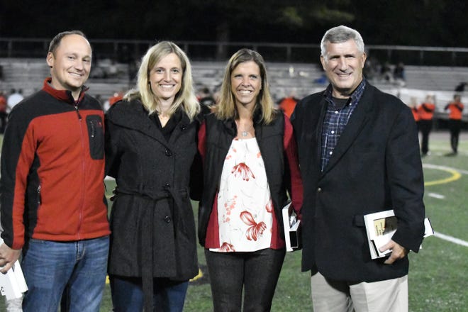 Four of the five Hall of Famers inducted into the Pocono Mountain East Cardinal Hall of Fame on Friday night in Swiftwater. The class of 2017 from left: Neil Unternahrer, Megan Bossuyt, Cheri Neff-Prior, and John Nauman. Nathan Reddicks (not pictured). [Bob Shank for the Pocono Record]