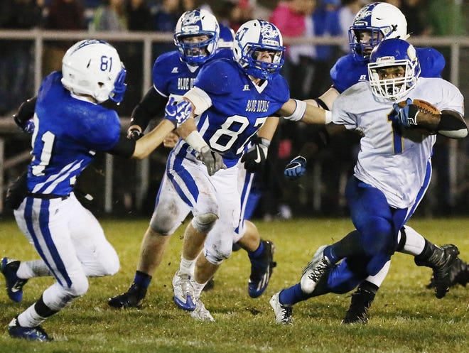 Wareham running back Issac Nascimento eludes a group of Fairhaven defenders. Nascimento was named the 2016 Standard-Times Offensive Player of the Year. [MIKE VALERI/THE STANDARD-TIMES/SCMG]