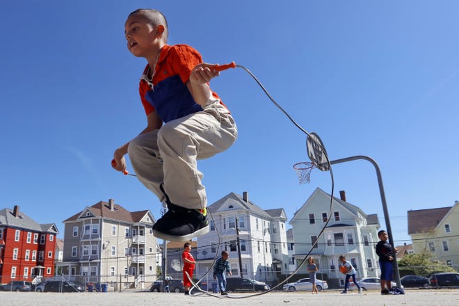 Jorge Miranda. 7, jumps rope as he and fellow Congdon School second-graders play during recess in New Bedford. 

[ PETER PEREIRA/THE STANDARD-TIMES/SCMG ]