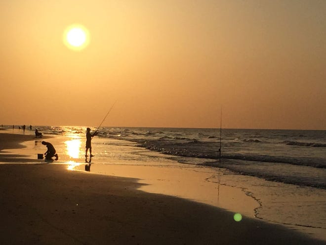 Dawn and dusk are frequently prime times for a bit of fishing off the sand, particularly when good current flow falls at the same time. [CONTRIBUTED PHOTO]