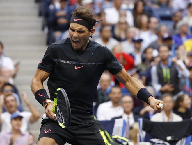 Rafael Nadal, of Spain, reacts after scoring a point against Kevin Anderson, of South Africa, during the men's singles final of the U.S. Open on Sunday in New York. [ASSOCIATED PRESS/ADAM HUNGER]