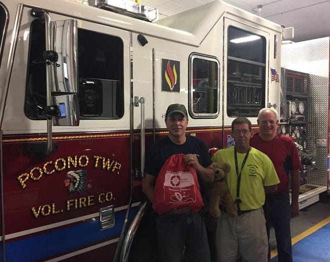Pocono Township Volunteer Fire Company receives donation to help save pets. Pictured from left are: Mike Sierra, Jonathan Plisko and Stephen Jacobs. [Photo provided]