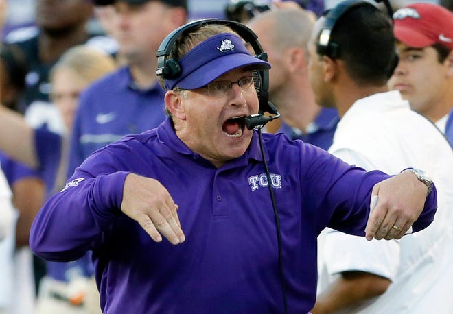 FILE - In this Sept. 10, 2016, file photo, TCU coach Gary Patterson signals from the sideline during the first half of the team’s NCAA college football game against Arkansas in Fort Worth, Texas. TCU visits Arkansas on Saturday, Sept. 9. (AP Photo/Tony Gutierrez, File)