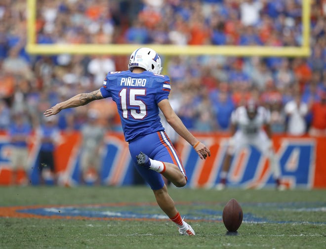Florida kicker Eddy Pineiro winds up for a kickoff against South Carolina last season at Ben Hill Griffin Stadium. The stadium suffered only minimal damage during Hurricane Irma's visit. [Brad McClenny/Staff Photographer]