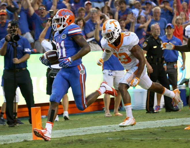 Florida Gators wide receiver Antonio Callaway (81) scores the go-ahead touchdown during the second half of the Gators' come-from-behind 28-27 win against the Tennessee Volunteers on Sept. 26, 201,5 at Ben Hill Griffin Stadium in Gainesville. [Rob C. Witzel / Gatehouse Media file]
